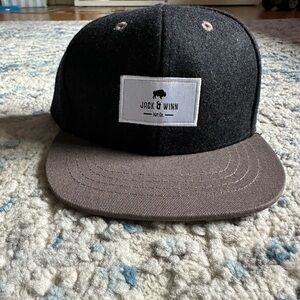 Jack & Winn SnapBack size small (18-24m).